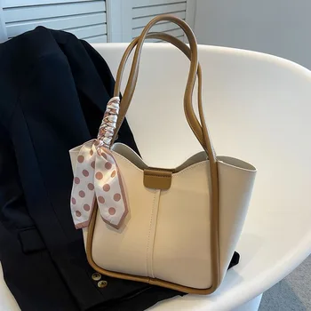 Маленькая и стильная переносная сумка-ведро с диагональным крестом через плечо